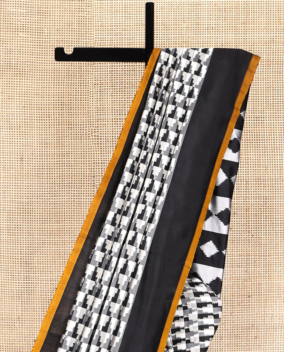 Black and White Pochampally Ikat Silk Saree, Spotlighted with Geometric Patterns on Its Body, Complemented by Contrast Border, Pallu of Diamond Patterns, and Paired with a Contrast Blouse - Image 3