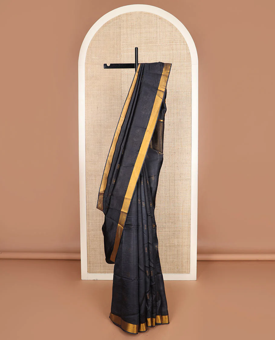 Black buttas banana pith saree, zari border, and zari striped pallu