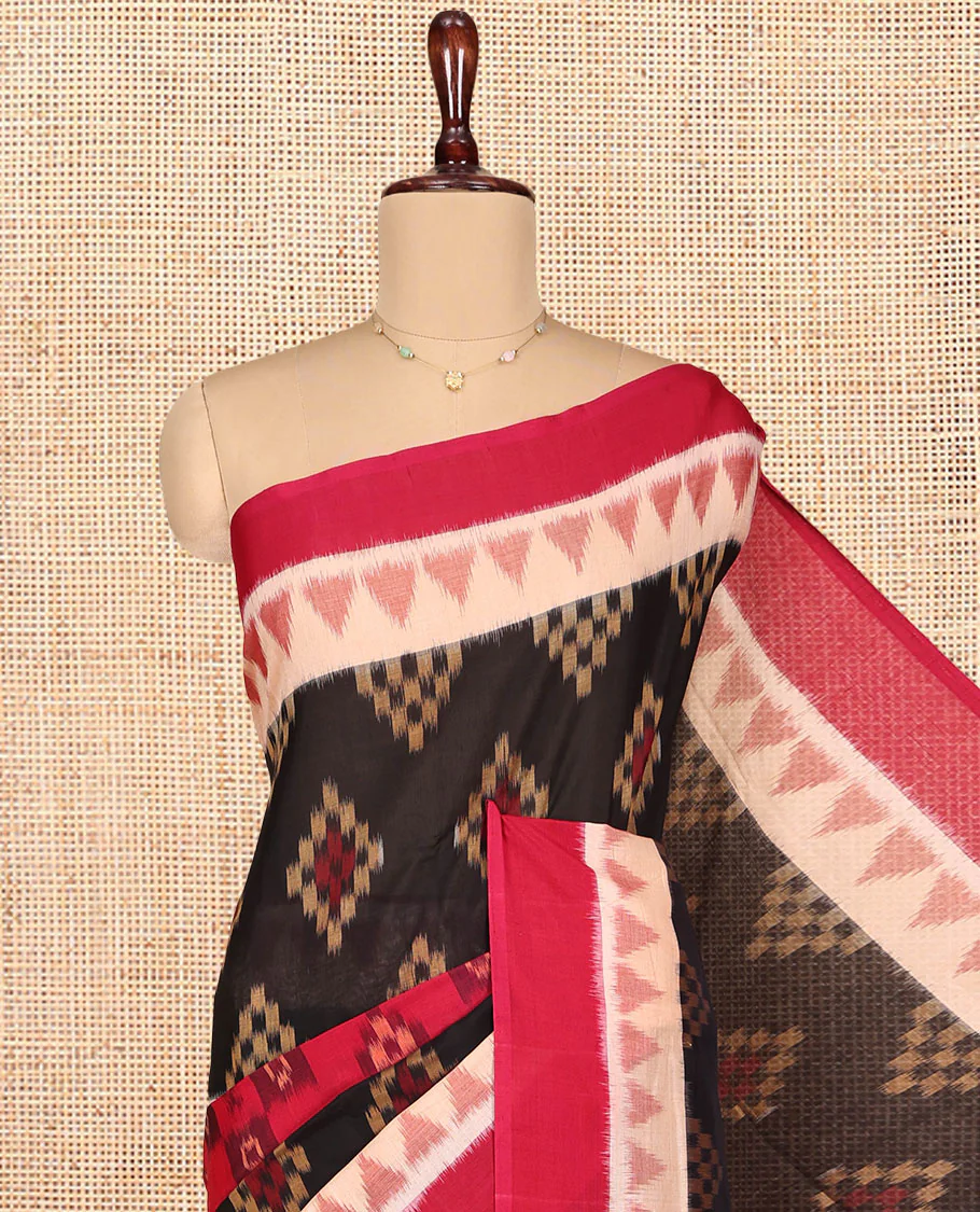 Black Ikkat Cotton Saree, Ornamented with Ikkat-style Buttas All Over Its Body, Complemented by a Contrast Temple Border, Pallu of Geometric Patterns, and Paired with a Contrast Blouse - Image 2