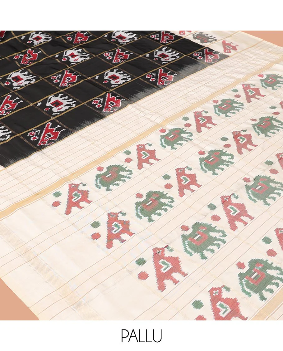Black Ikkat Silk Saree, Impeccably Styled with Patola-Style Parrot-Elephant Butta Enclosed Checks on Its Body, Complemented by a Contrast Patola-Style Parrot-Elephant Butta Enclosed Border, Pallu of the Same Motifs, and Paired with a Contrast Blouse - Image 5