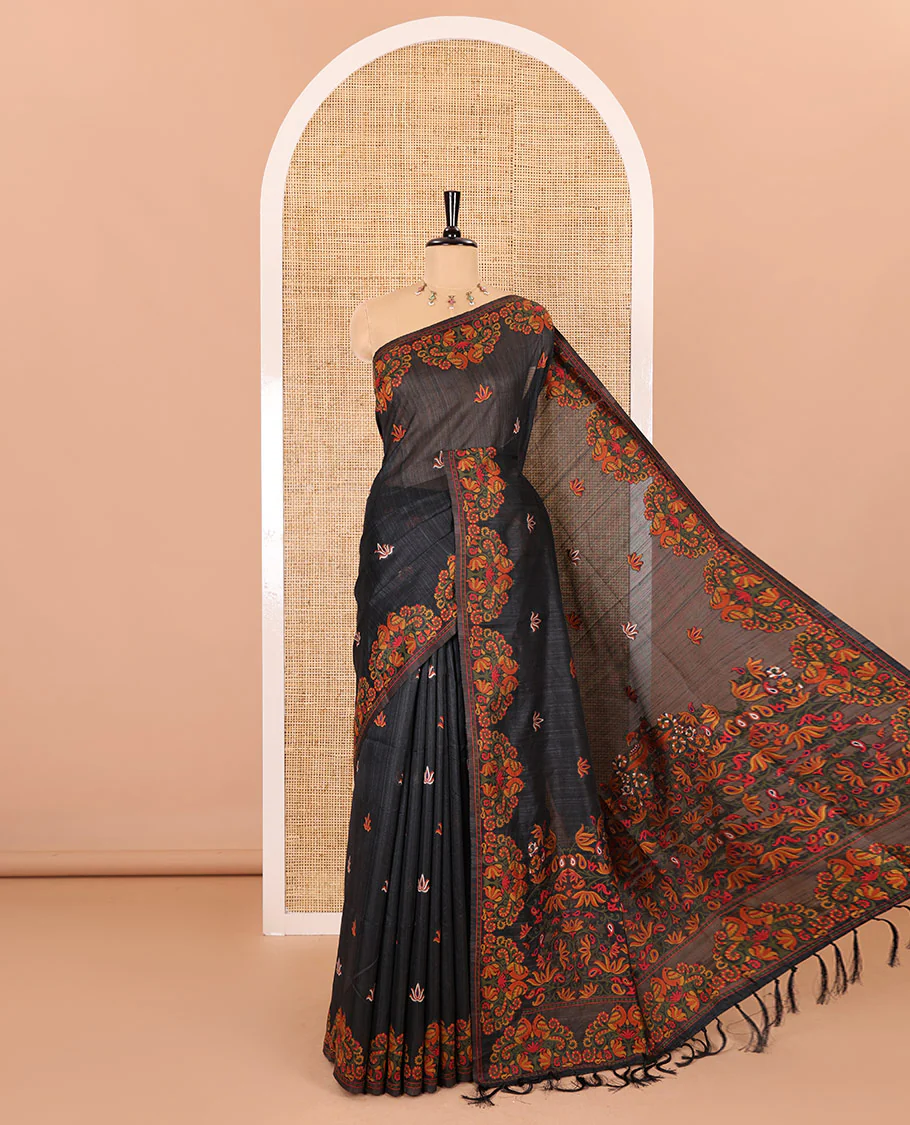 Black lotus motifs thread woven jute cotton, scallop thread woven border, pallu of lotus, peacock and paisley designs along with a plain blouse