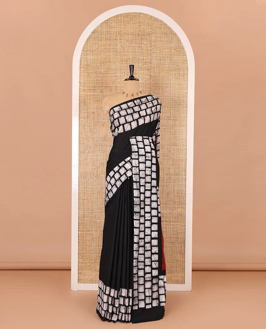 Black plain mul cotton saree, batik style checks printed border, contrast batik printed pallu, and a contrast batik printed blouse - Image 2