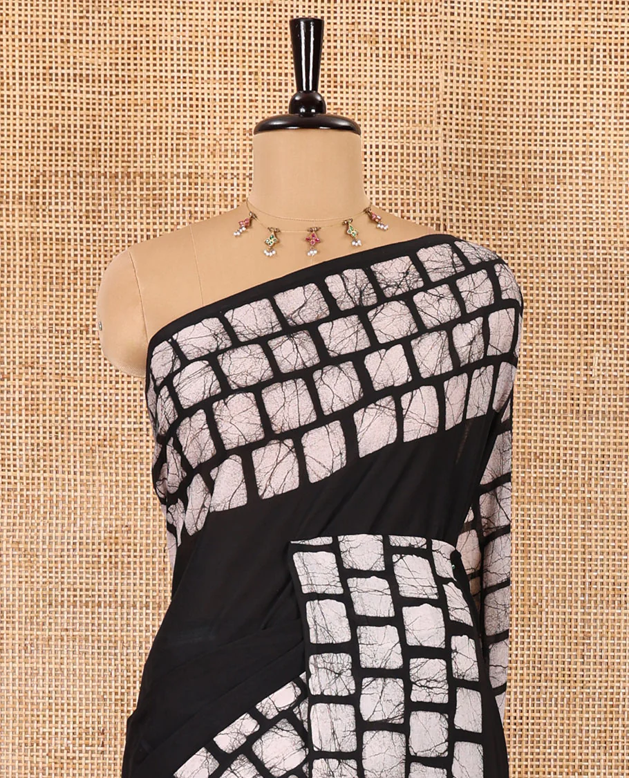 Black plain mul cotton saree, batik style checks printed border, contrast batik printed pallu, and a contrast batik printed blouse - Image 3
