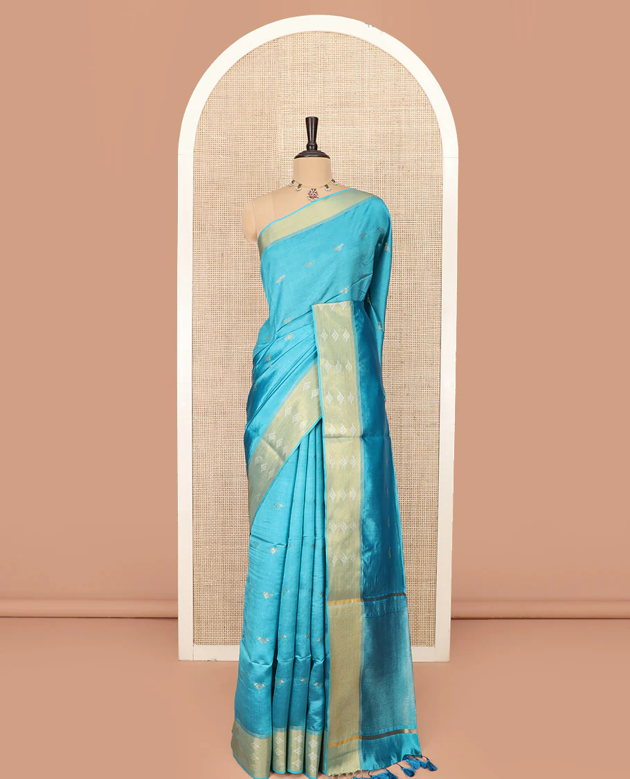 Blue Banana Pith Saree Elegantly Framed with Zari Buttas, Artfully Detailed Border with Zari Designs, Gleaming Zari Stripes Woven Pallu, and Paired with a Matching Plain Blouse - Image 3