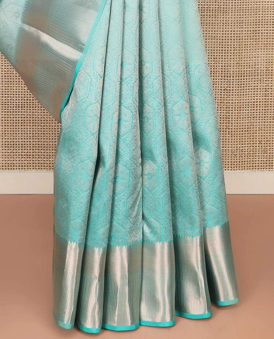 Blue Kanchipuram Wedding Silk Saree Subtly Sparkled with Jacquard Designs, Highlighted with Zari Border of Thilakam Mokku, Banaras, and Mayil Kann Designs, Grandly Zari Woven Pallu, and Paired with a Matching Blouse - Image 4