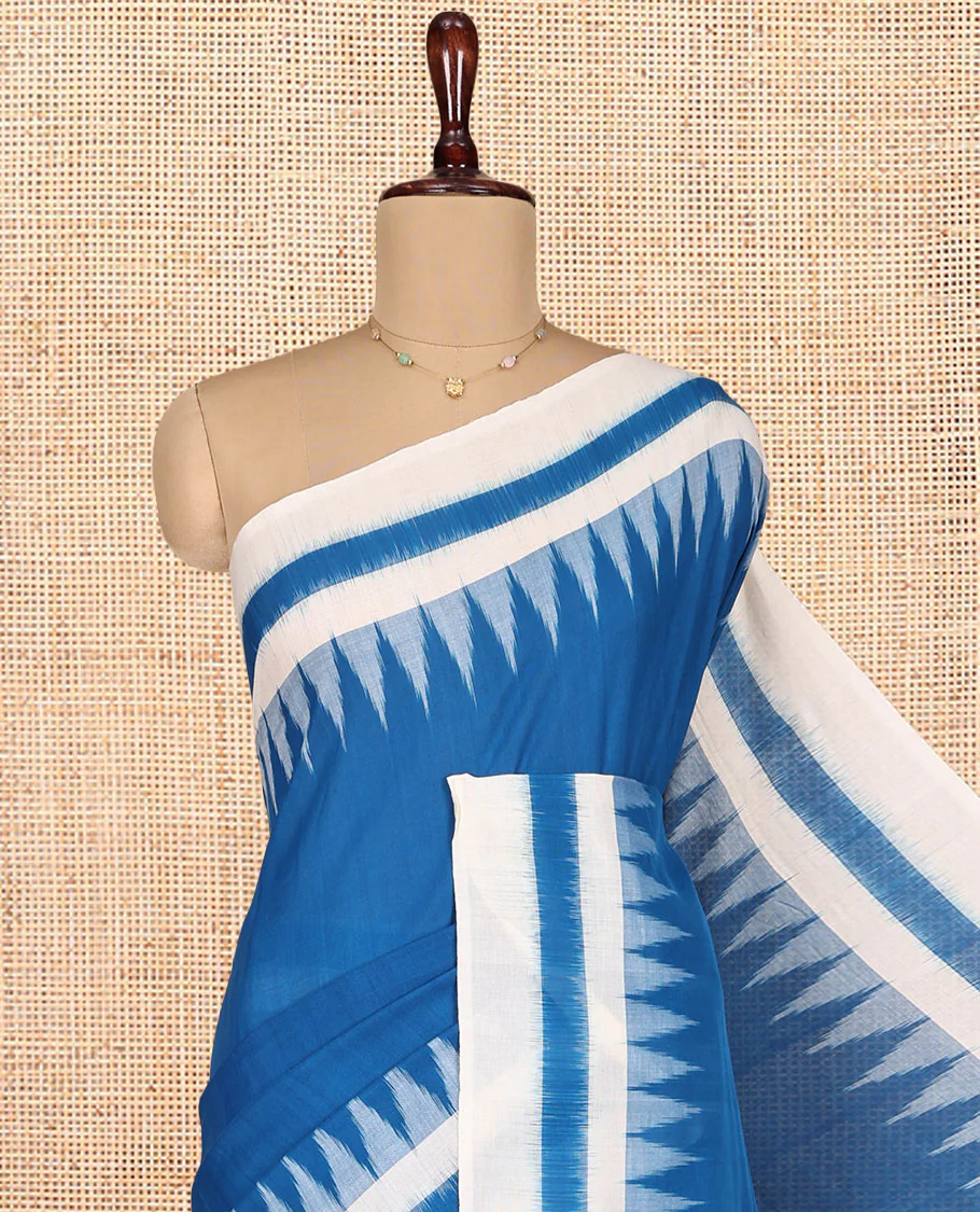Blue Plain Ikkat Cotton Saree, Complemented by a Contrast Ikkat Temple Border, Pallu Steeped with Buttas, and Paired with a Contrast Blouse - Image 2