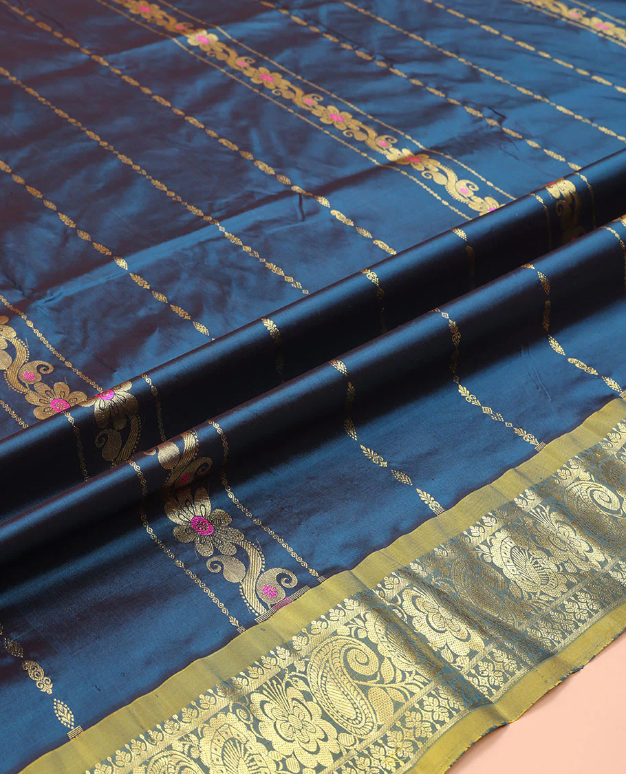 Blue Pure Silk Half-Saree, Adorned with Zari Designs on Its Body, Complemented by a Contrast Floral and Paisley Design Border, Complemented by a Contrast Blouse, and Paired with a Contrast Dhavani of Leaf-Paisley Designs - Image 5