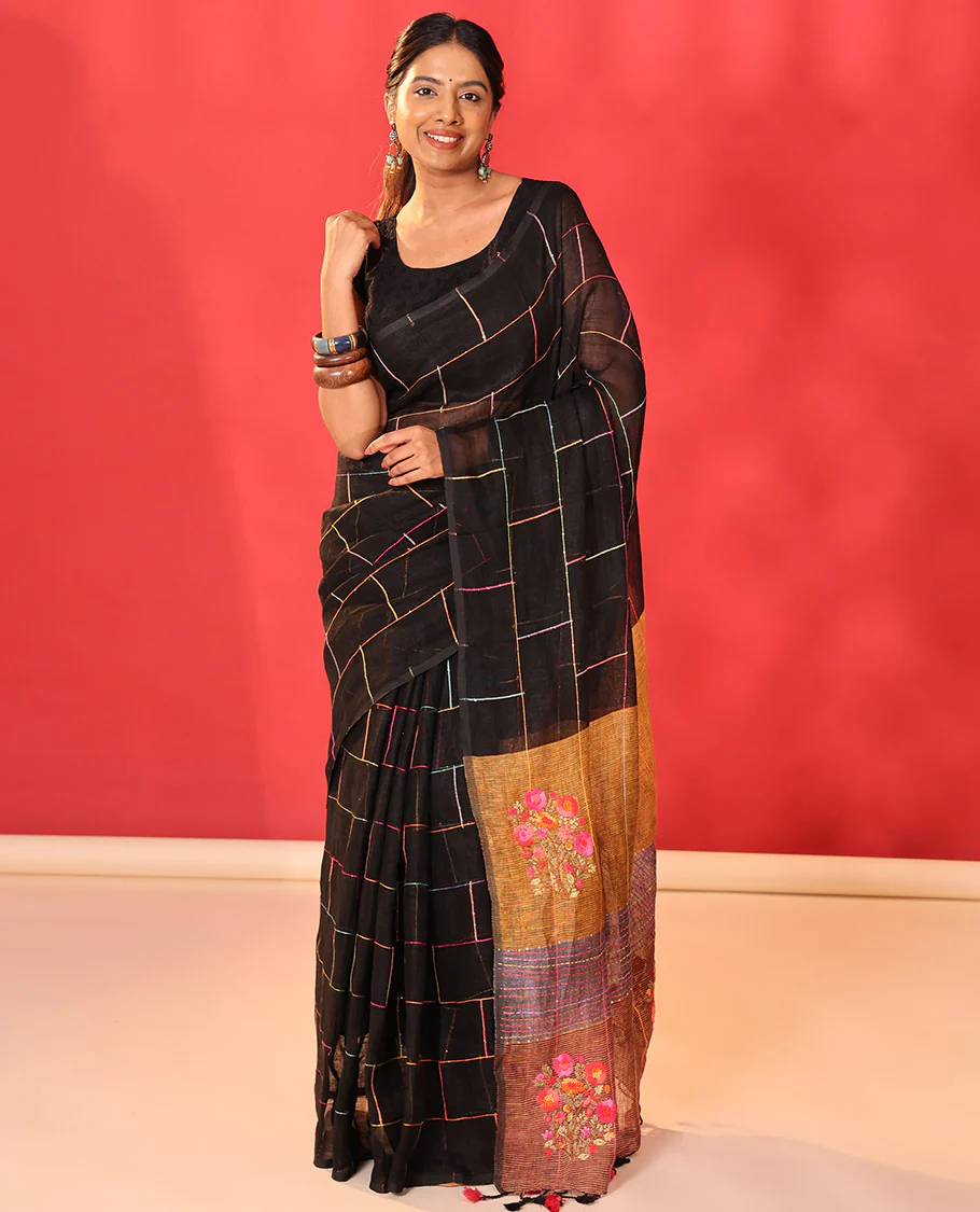 Borderless black checked linen cotton saree, contrast pallu of colorful floral motifs