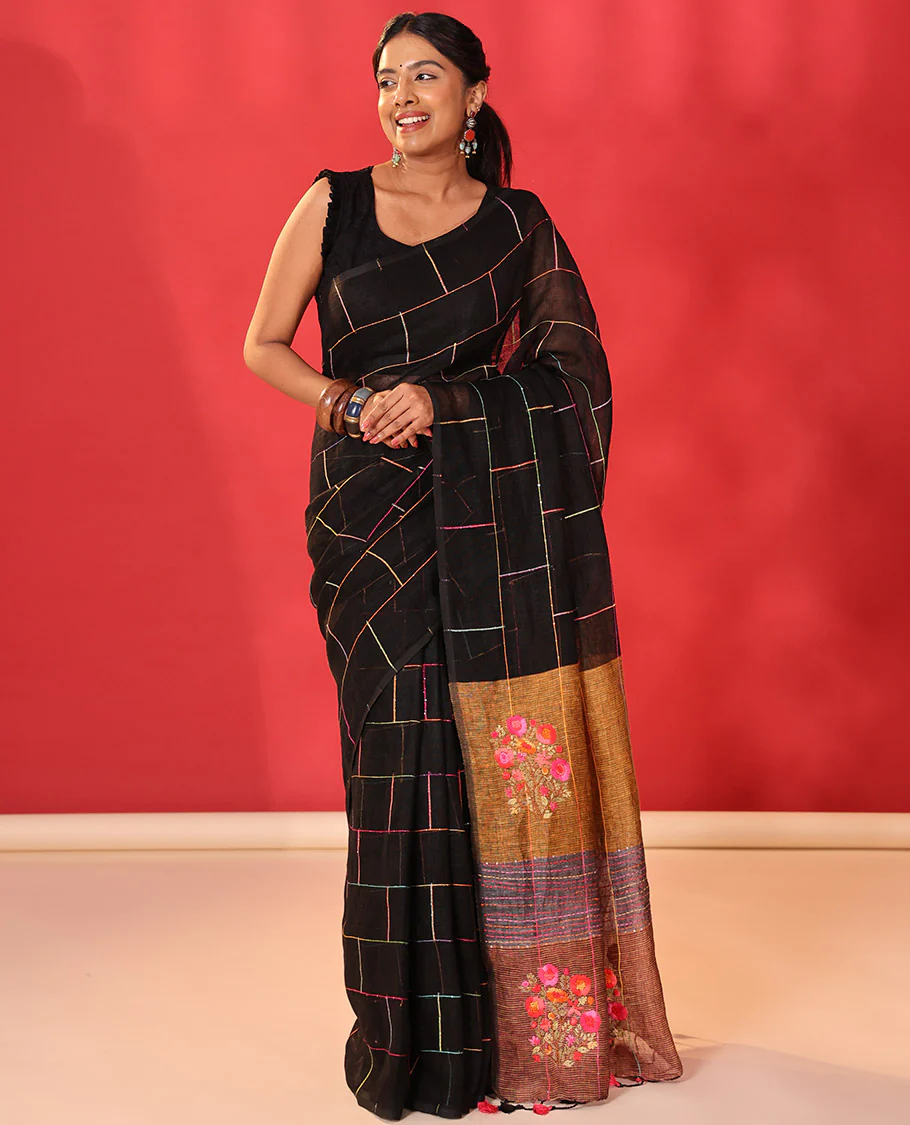 Borderless black checked linen cotton saree, contrast pallu of colorful floral motifs - Image 3