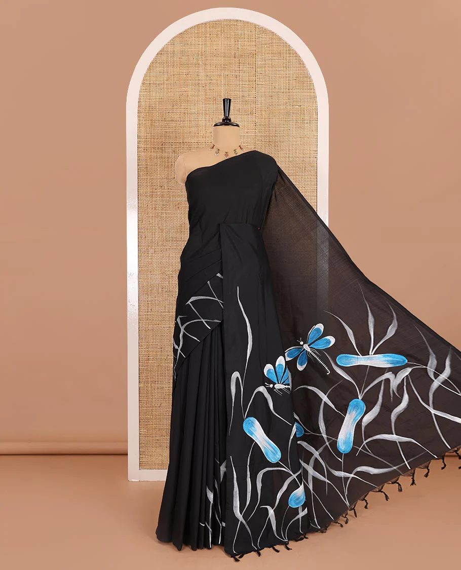 Borderless black floral and dragonfly motifs printed South cotton saree, printed pallu, and a matching floral printed blouse