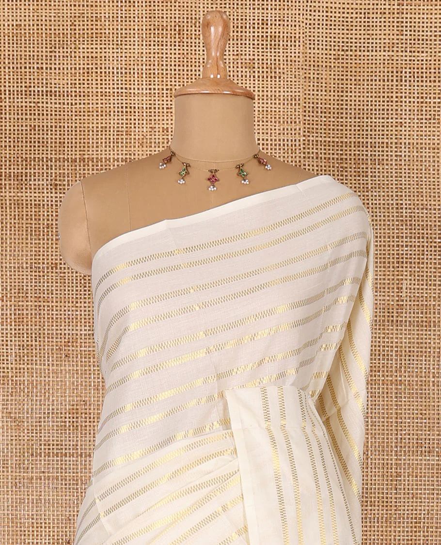 Borderless cream and maroon horizontal zari muthu striped Kerala cotton saree, self-pallu with tassels and a matching blouse - Image 5