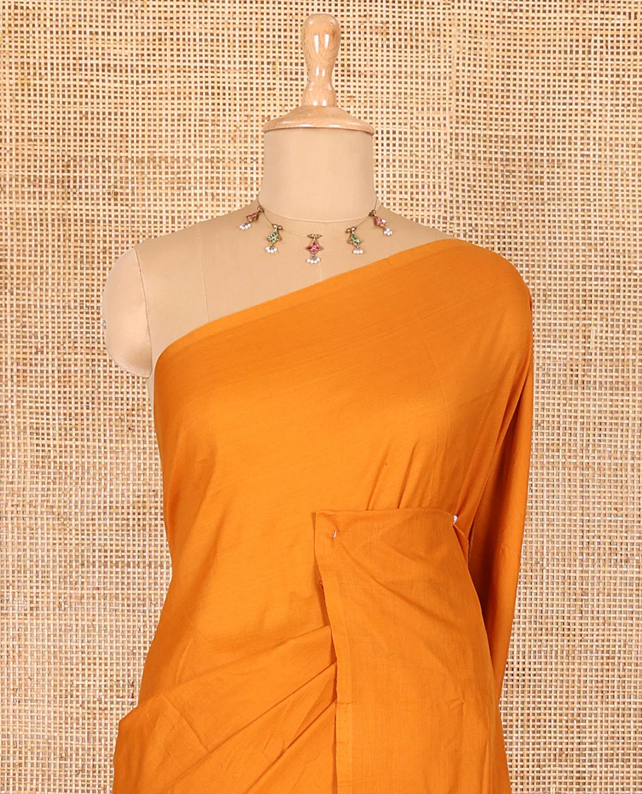 Borderless mustard pear fruit-shaped patchwork South cotton saree with a matching blouse and a contrast paisley vine printed blouse - Image 3