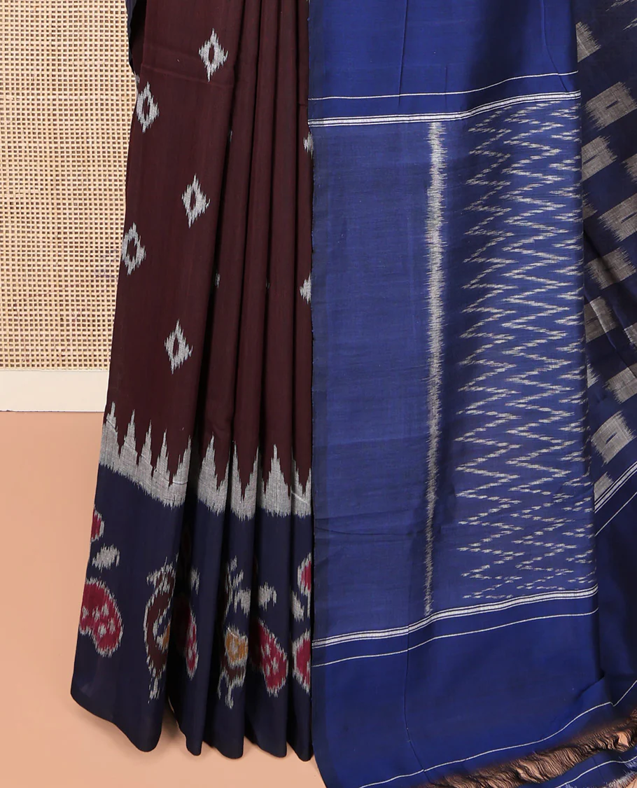 Brown Ikkat Cotton Saree, Decked Up with Ikkat Buttas All Over Its Body, Complemented by a Contrast Ikkat-Style Border of Peacock Buttas, Chevron Striped Pallu, and Paired with a Contrast Blouse - Image 3