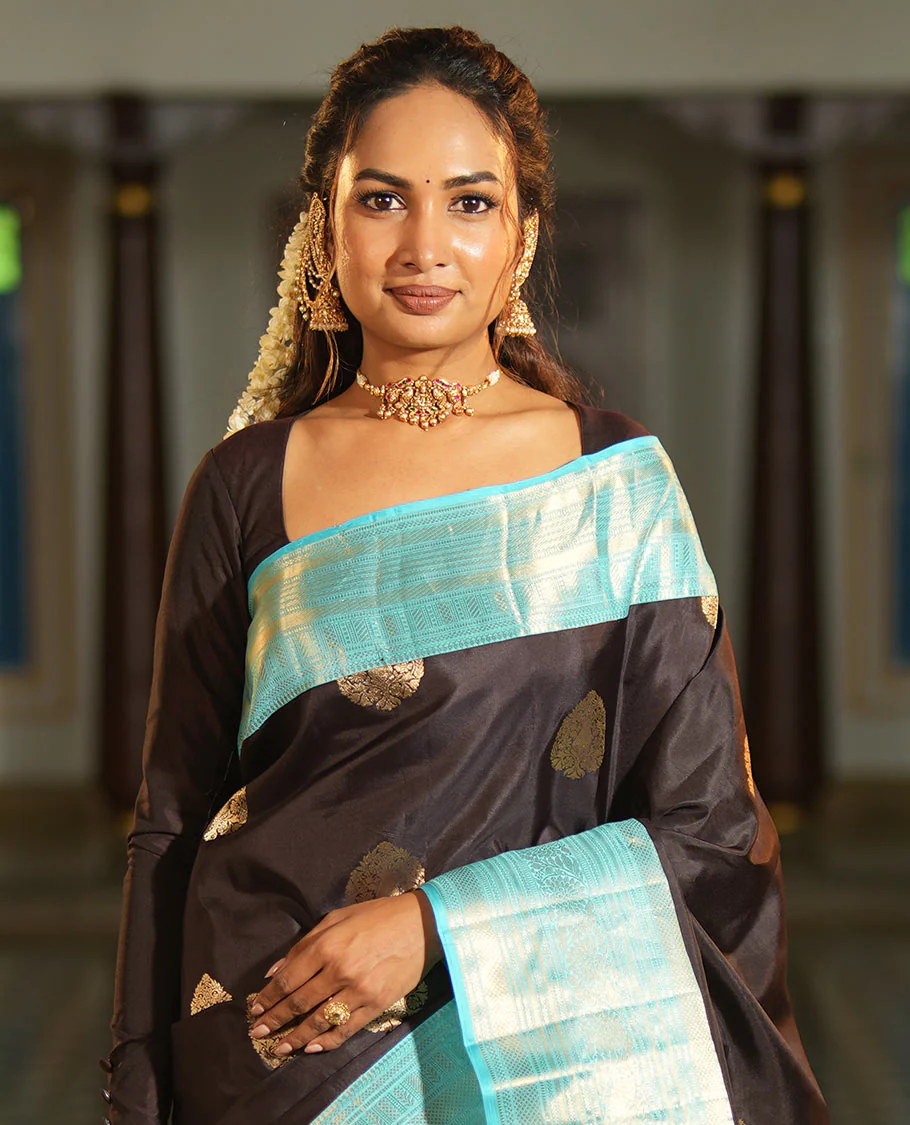 Brown Vasundhara Silk Saree, Spotlighted with Zari Buttas All Over Its Body, Complemented by a Contrast Border of Kodi Visiry Designs, a Grand Pallu, and Paired with a Contrast Blouse - Image 3