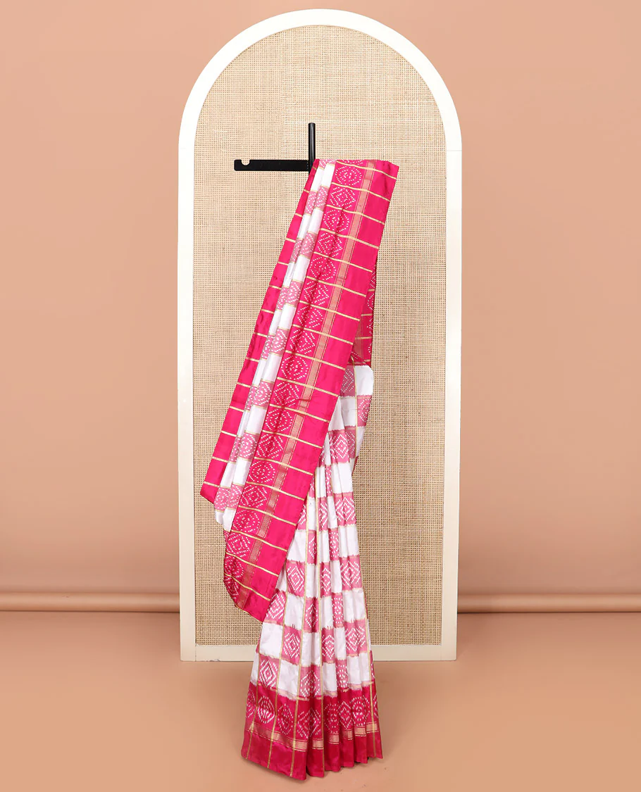 Cream and Pink Ikkat Silk Saree with Ikkat Buttas Enclosed in Checks, Complemented by a Contrast Ikkat Design Border, a Hazily Woven Pallu of Ikkat Patterns, and a Contrast Checked Blouse - Image 2