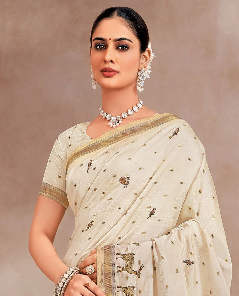 Cream animal motifs designer saree, deer motifs featured on its border, and striped pallu - Image 2