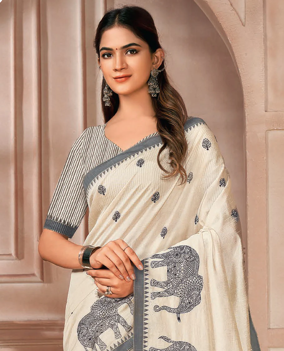 Cream elephant motifs embroidered designer saree, contrast temple border, and pallu of stripes - Image 2