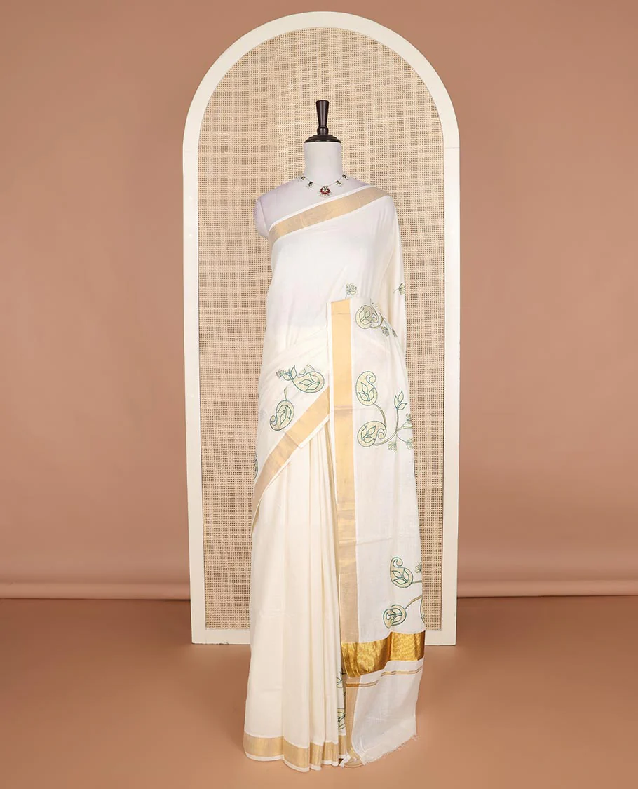 Cream paisley embroidered Kerala cotton saree, zari border, and paisley embroidered pallu - Image 2