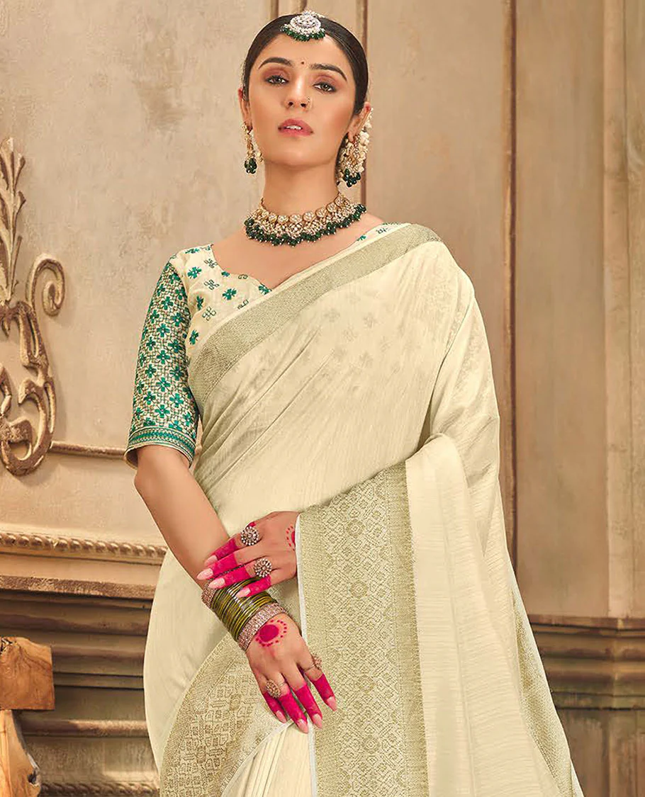 Cream plain designer saree, patola-style motifs woven border, and zari striped pallu - Image 2