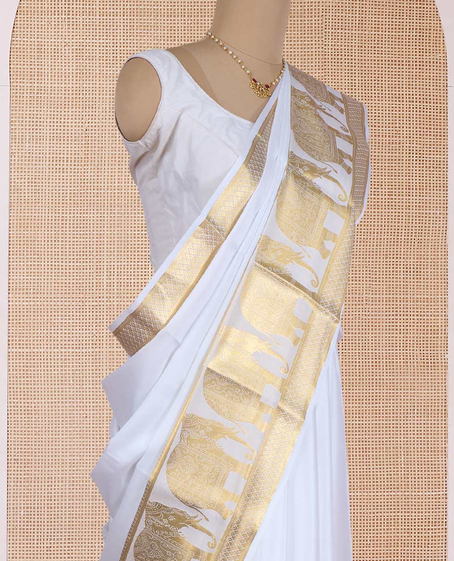 Cream plain Mysore silk saree, traditional zari border of elephant motifs, and pallu steeped with manga designs - Image 3