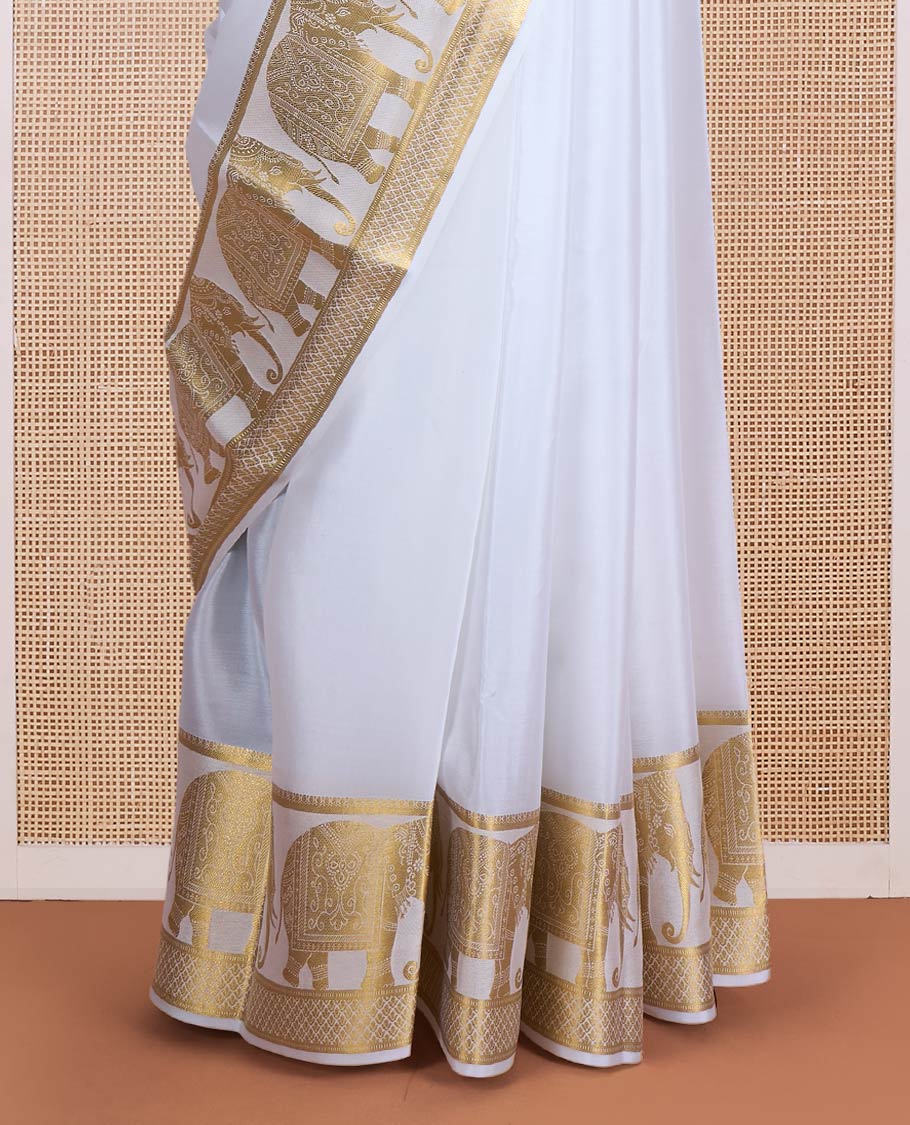 Cream plain Mysore silk saree, traditional zari border of elephant motifs, and pallu steeped with manga designs - Image 4