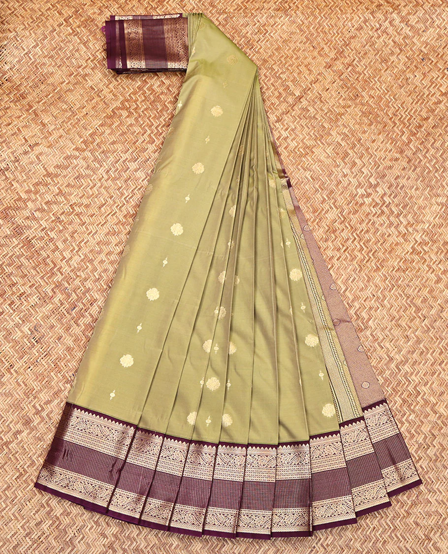Green Budget Silk Saree, Adorned with Zari Buttas All Over Its Body, Complemented by Contrast Border of Traditional Zari Designs, Gleaming Zari Design Pallu, and Paired with a Contrast Blouse - Image 2