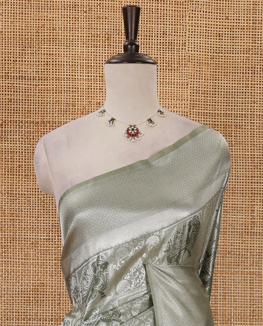 Green floral & elephant jacquard softy saree, diamond design zari border, intricate pallu & matching jacquard blouse - Image 3