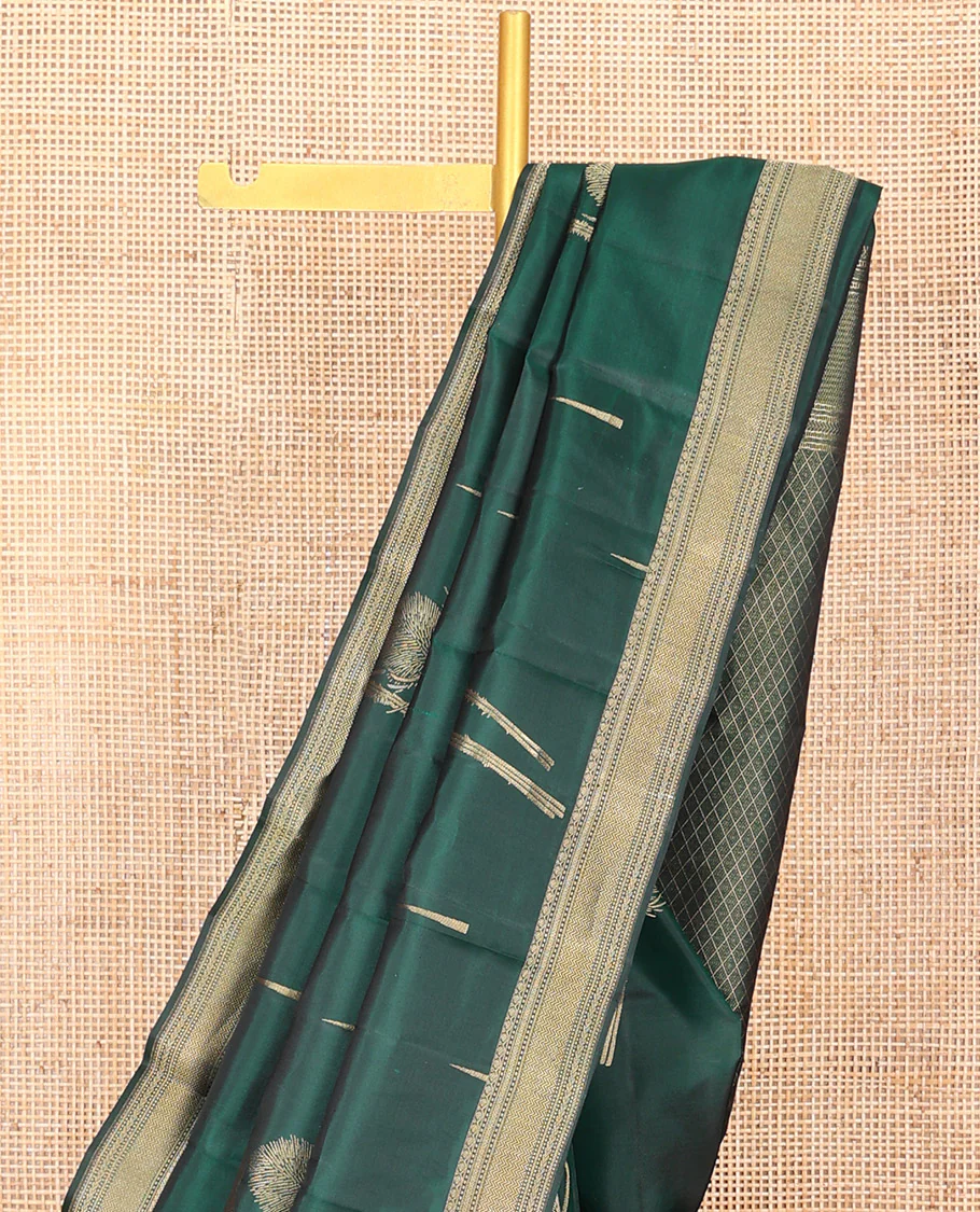 Green Vasundhara Silk Saree Creatively Designed with Thazampoo Rekku Buttas and Vel Buttas, Highlighted with a Zari Border of Manga, Muthu, Kathir, Neli, and Vanki Designs, Subtly Sparkled Pallu of Jaal Design, and Paired with a Matching Blouse - Image 3
