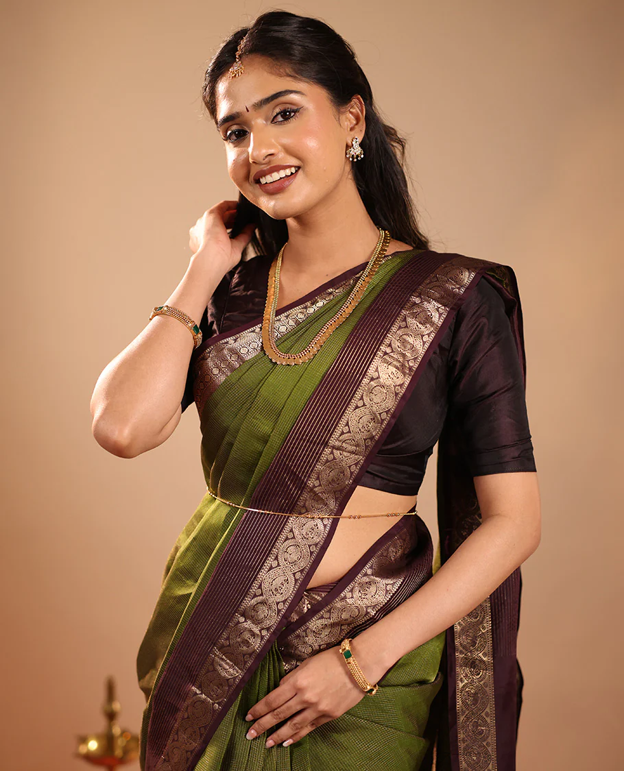 Green Vasundhara Silk Saree Mesmerized with Zari Micro-Checks All Over Its Body, Complemented by a   Contrast Border of Rekku, Kamalam, Mayil Kann, Yaanai and Mayil Designs, Subtly Sparkled Pallu of Jaal Designs, and Paired with a Contrast Blouse - Image 3