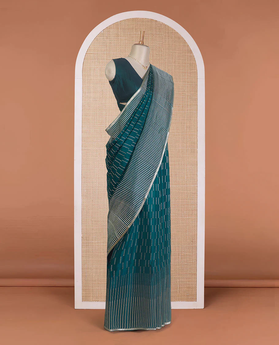 Green zari buttas Mysore silk saree, temple seppu rekku zari border, and chevron design pallu