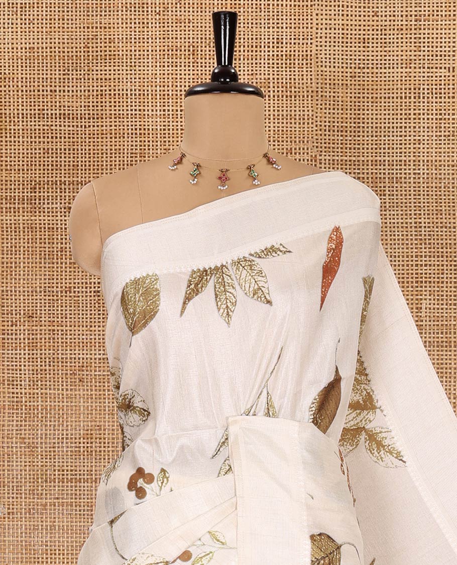 Half-white unique size and shaped leaf motifs printed fancy tussar saree, resham thread woven border, leaf motifs printed pallu, and a matching striped blouse - Image 2