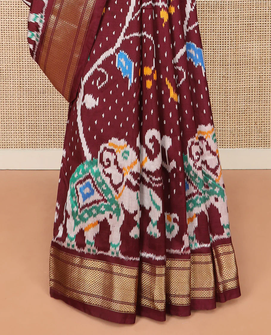 Maroon Ikkat Silk Saree with Colourful Elephant and Free-Style Ikkat Buttas, a Subtly Woven Zari Border, a Vibrantly Woven Pallu of Ikkat Patterns, and a Plain Blouse - Image 4