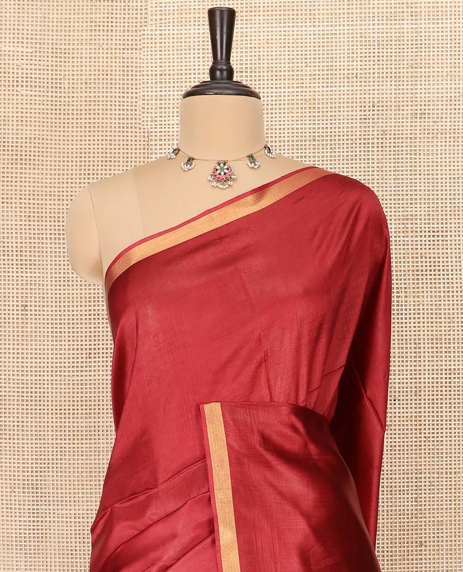 Maroon Plain Banana Pith Saree Subtly Sparkled with Zari Bavanji Border, Gleaming Zari Stripes Woven Pallu, and Paired with a Matching Plain Blouse - Image 2