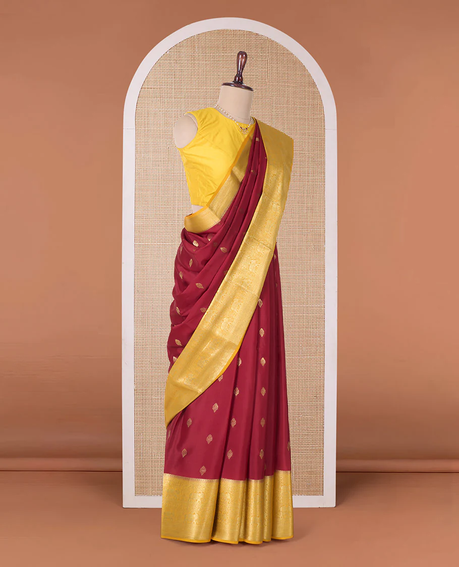 Maroon zari buttas Mysore silk saree with contrast traditional zari border, and a pallu of paisleys