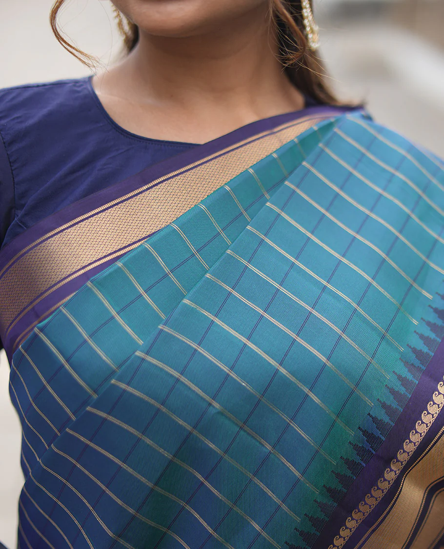 Mayil Color and Navy Blue Vasundhara Lite Silk Mix Saree, Graced with Checked Design All Over Its Body, Complemented by a Contrast Thazampoo Rekku Border of Manga Mokku, Muthu, and Mayil Kann Designs, Grand Pallu, and Paired with a Contrast Blouse - Image 3