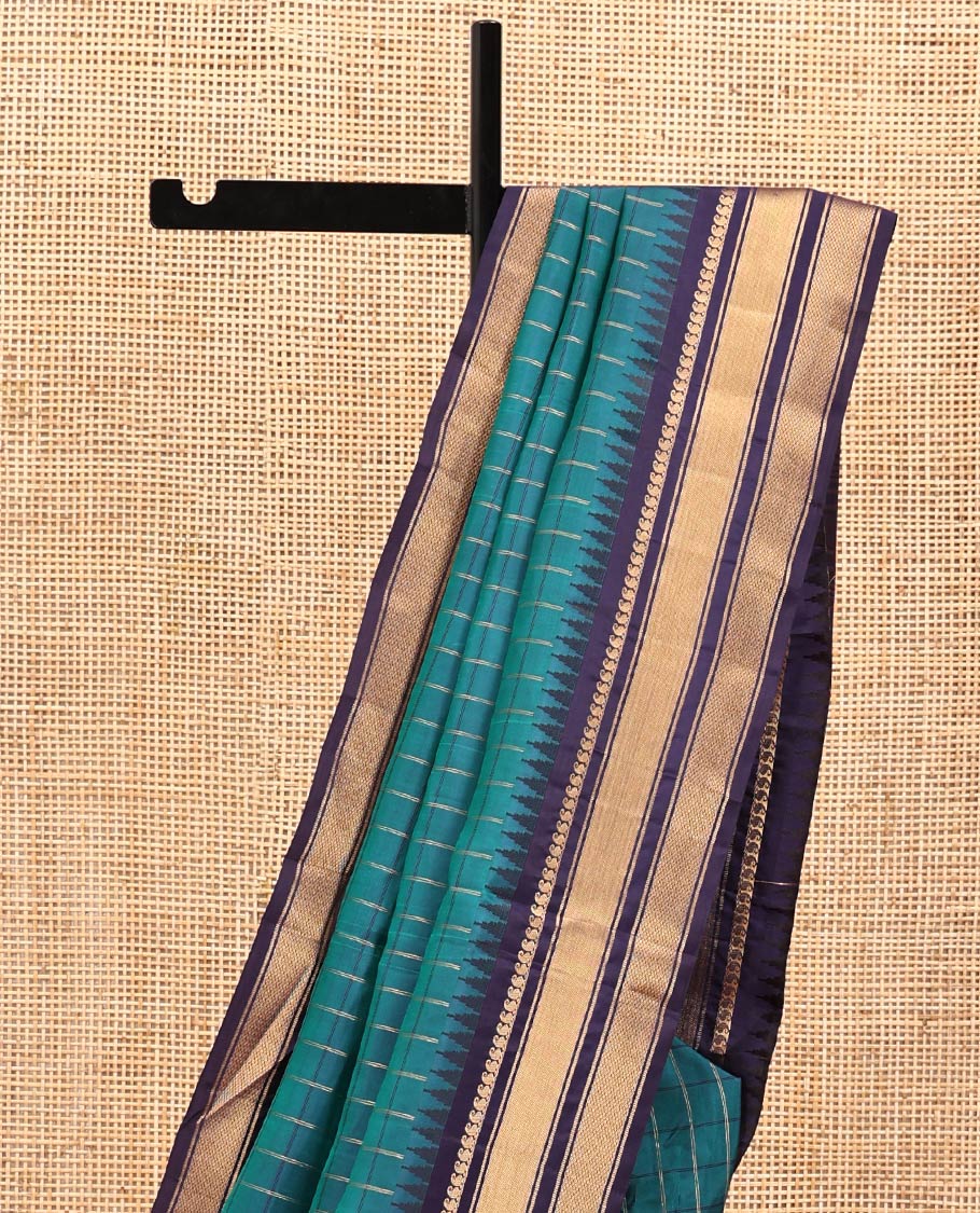 Mayil Color and Navy Blue Vasundhara Lite Silk Mix Saree, Graced with Checked Design All Over Its Body, Complemented by a Contrast Thazampoo Rekku Border of Manga Mokku, Muthu, and Mayil Kann Designs, Grand Pallu, and Paired with a Contrast Blouse - Image 6