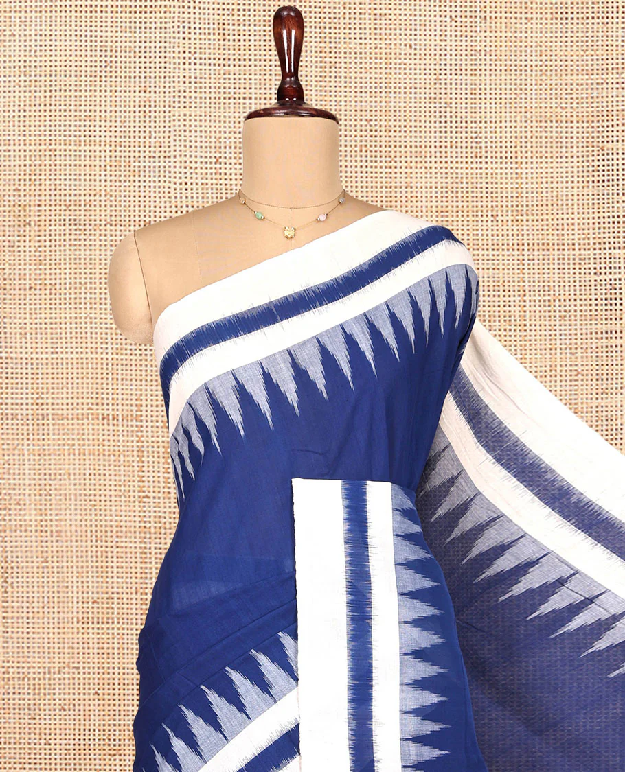 Navy Blue Plain Ikkat Cotton Saree, Complemented by a Contrast Ikkat Temple Border, Pallu Steeped with Buttas, and Paired with a Contrast Blouse - Image 2
