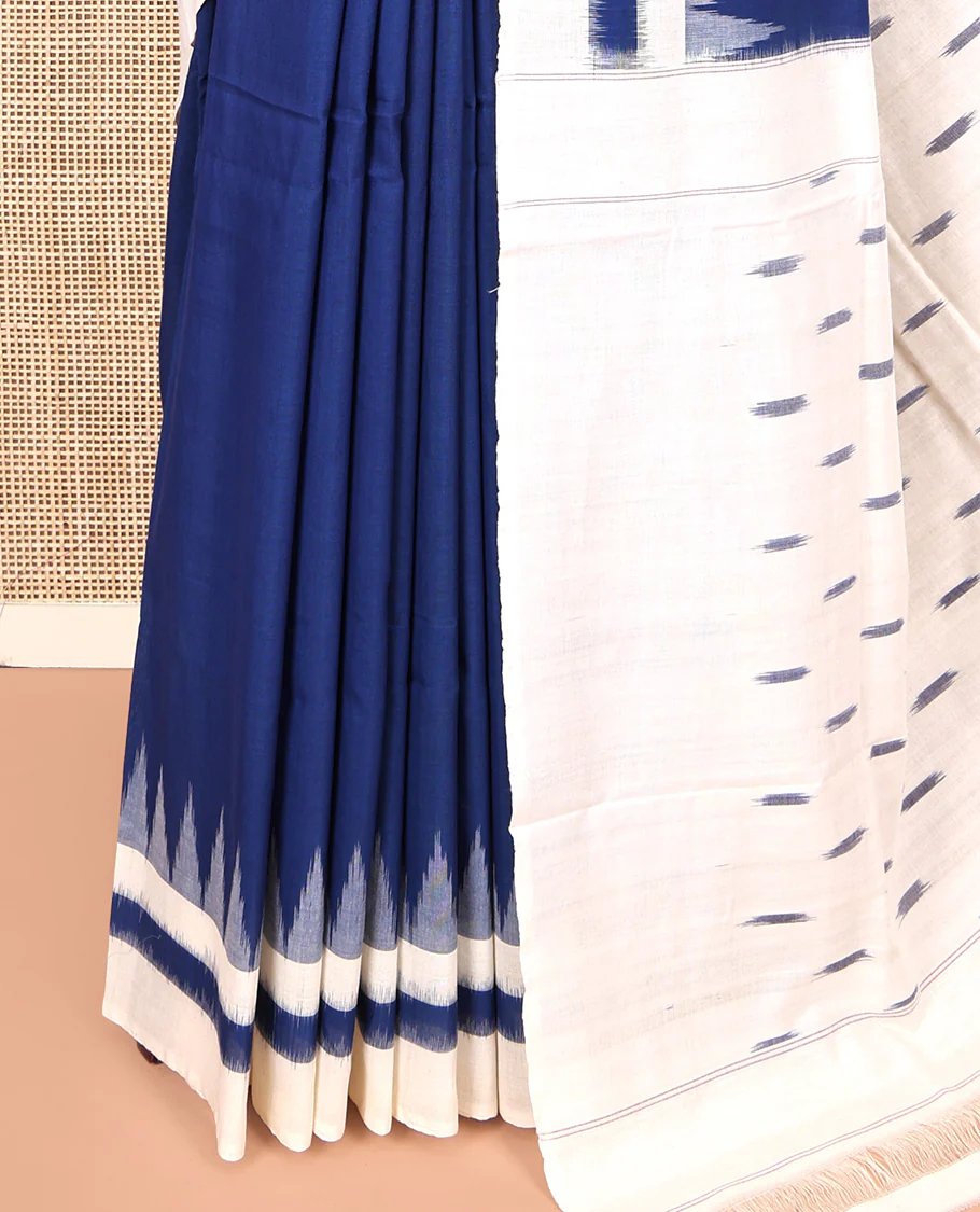 Navy Blue Plain Ikkat Cotton Saree, Complemented by a Contrast Ikkat Temple Border, Pallu Steeped with Buttas, and Paired with a Contrast Blouse - Image 3
