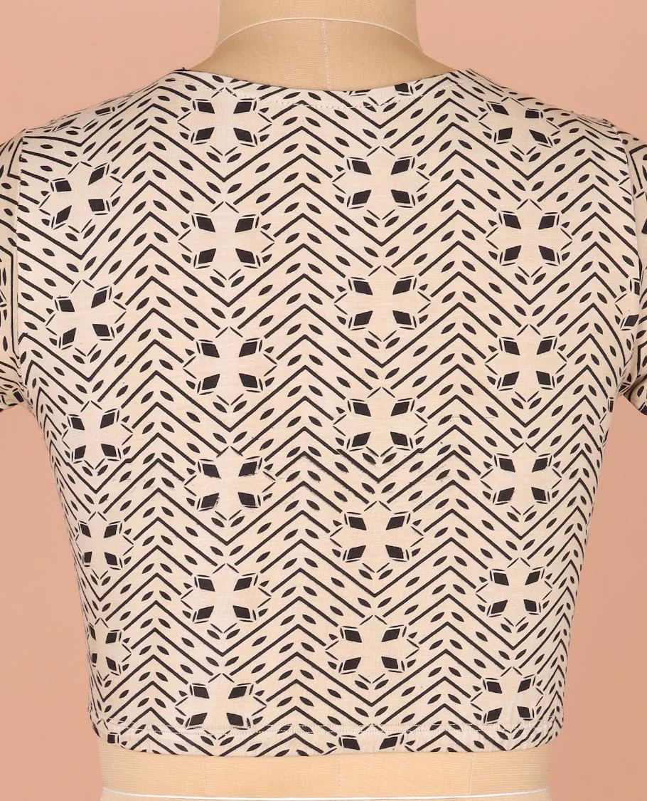 Off-White Readymade Blouse Prettified with Geometric Prints, Featuring a Front Round-Neck, a Back Closed Neck, and Elbow Sleeves - Image 4