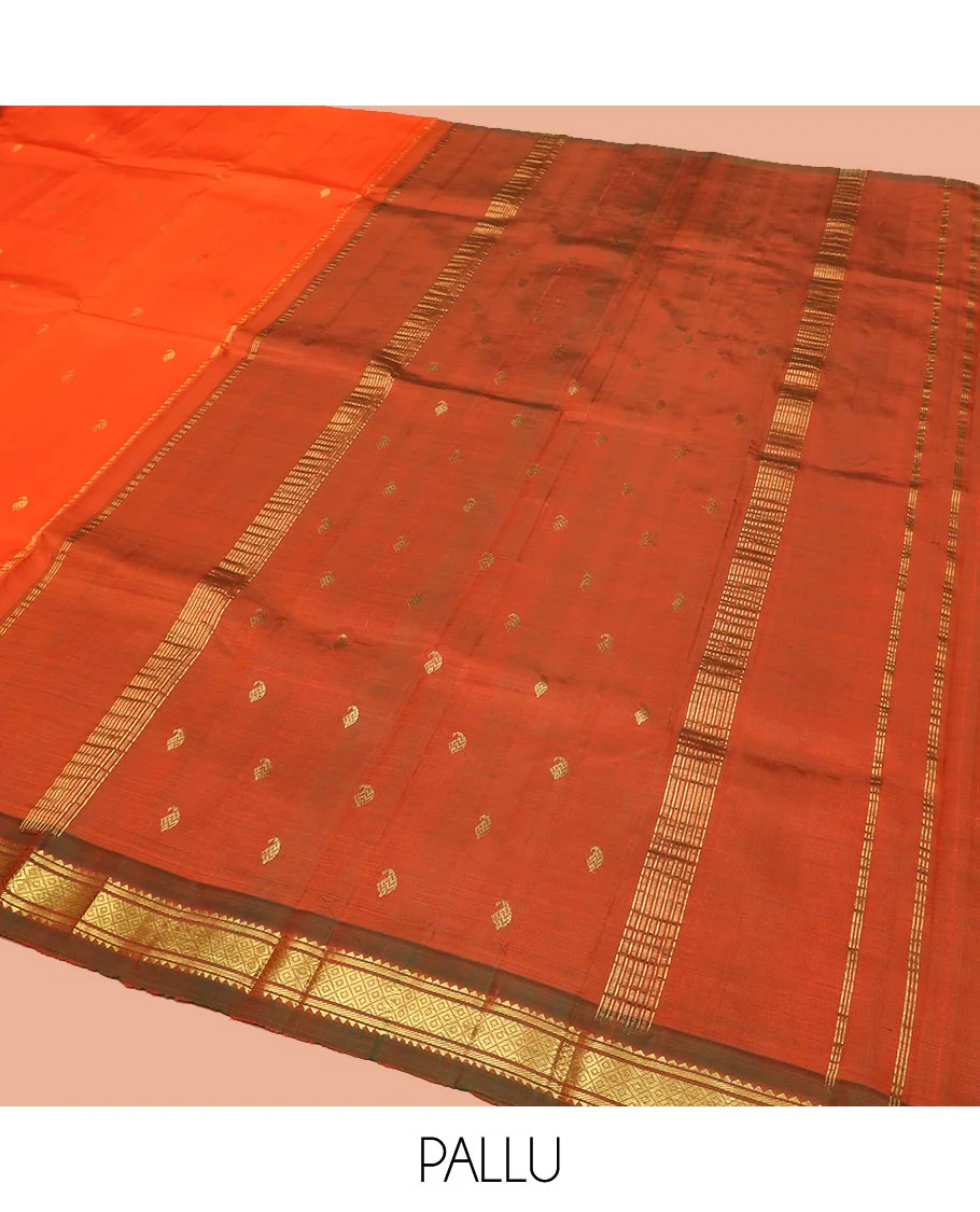 Orange Kanchipuram Silk Saree Mesmerized with Zari Buttas All Over Its Body, Complemented by a Contrast One-Sided Border of Rekku, Banaras, and Mayil Kann Designs, Pallu of Zari Stripes, and Comes Without a Blouse - Image 5