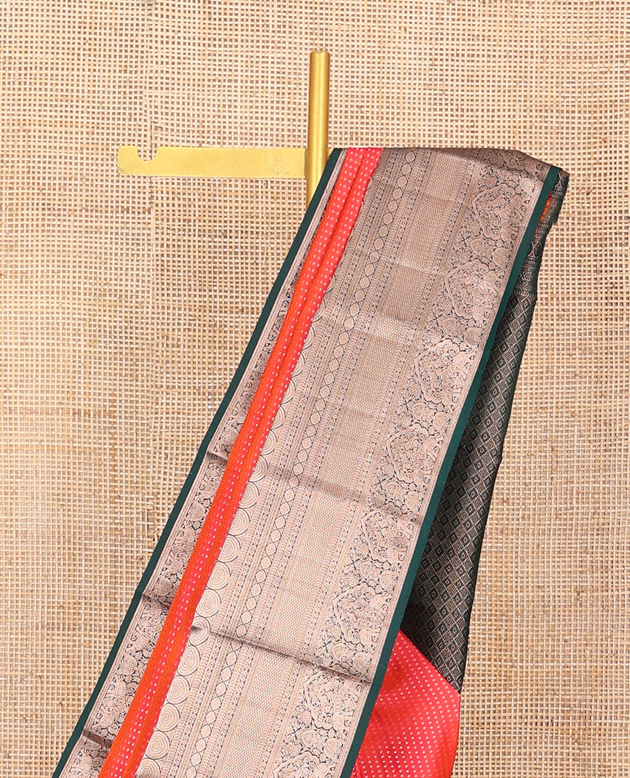 Orange Vasundhara Silk Saree Gracefully Embellished with Dobby-Style Zari Buttas, Highlighted by a Contrast Border of Rekku, Kathir, Cross Kamalam, Chakram, Mayil Kann, Mayil, and Yaanai, Scintillating Jaal Pallu, and Paired with a Contrast Blouse - Image 3