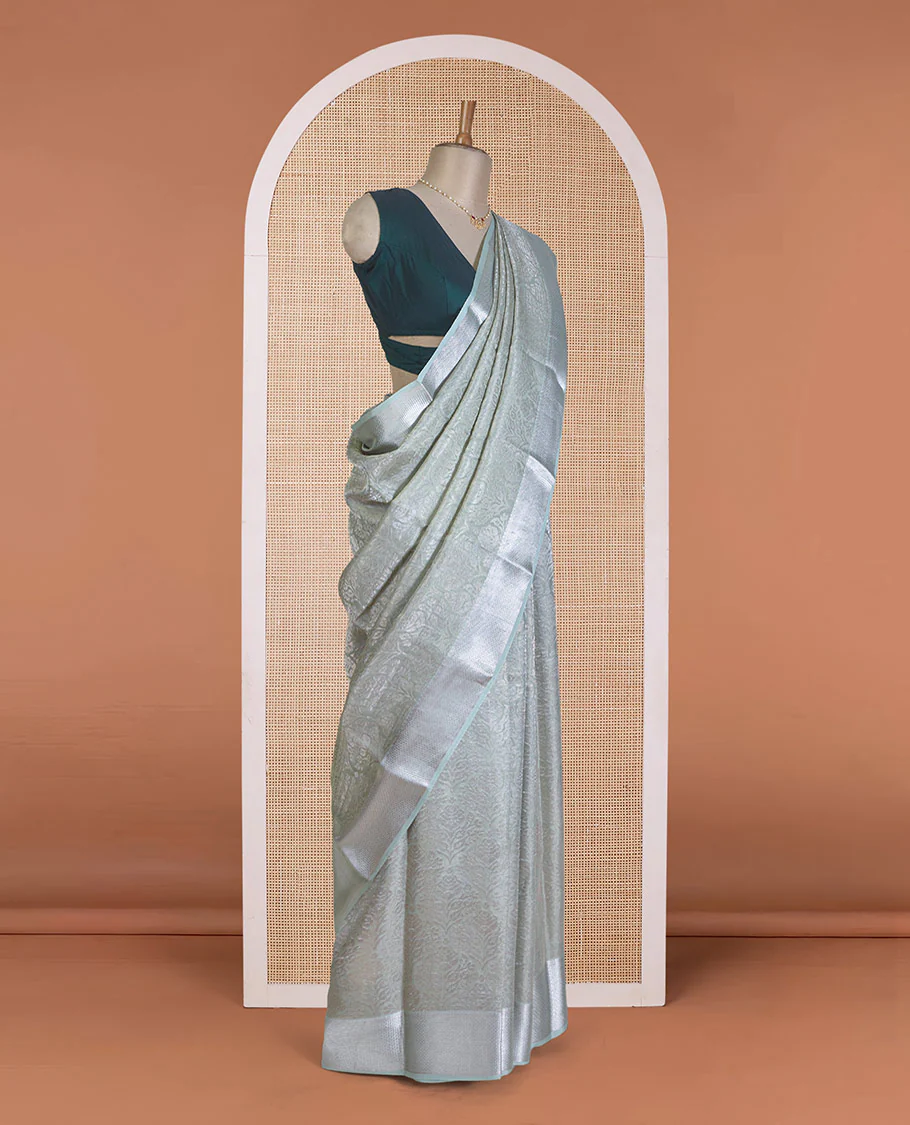 Pale green jacquard Mysore silk saree, traditional zari border, and jaal pallu