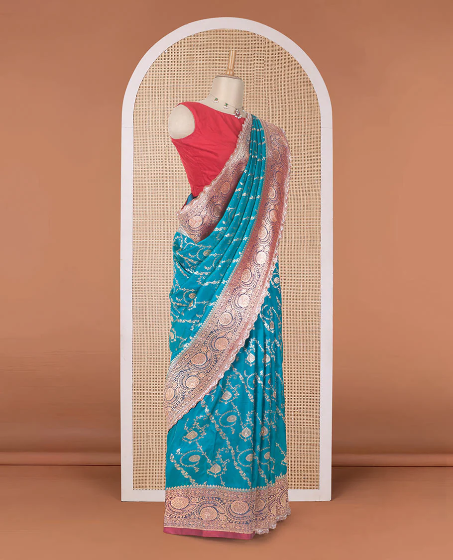 Persian green jacquard with micro stonework banaras nylon silk saree, contrast floral creeper zari and stone work border, and intricately zari woven pallu