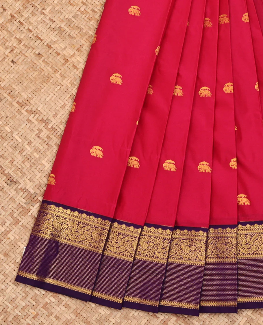 Pink Budget Silk Saree, Bedecked with Elephant Buttas All Over Its Body, Complemented by a Contrast Traditional Zari Border of Peacock Designs, Pallu of Jaal Designs, and Paired with a Contrast Blouse