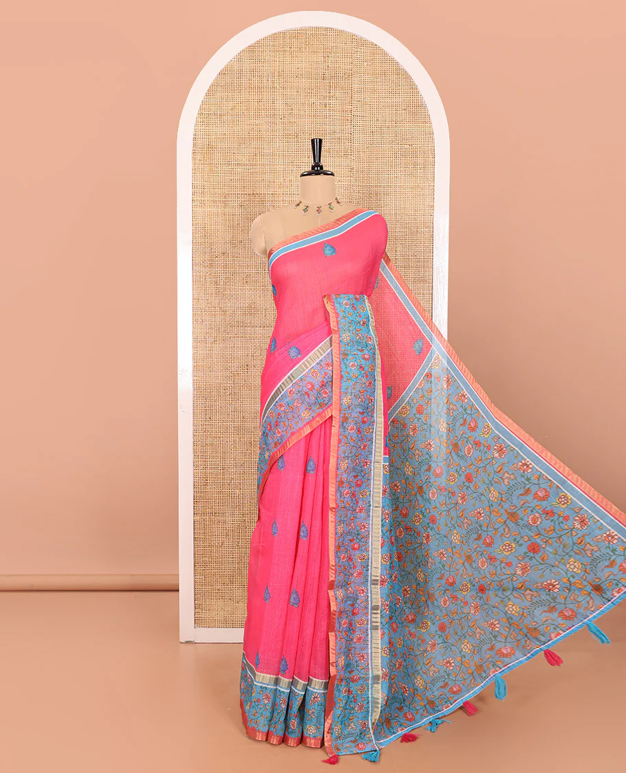 Pink Linen Saree Elevated with Leaf Motifs All Over Its Body, Complemented by a Contrast Floral Vine Printed Border, Pallu Mirrors the Floral Vine Print, and Paired with a Contrast Floral Printed Blouse
