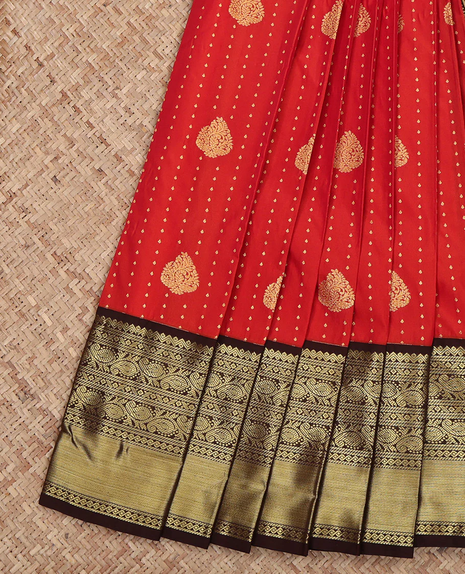 Red Budget Silk Saree, Steeped in Richness of Zari Buttas All Over Its Body, Complemented by a Contrast Traditional Zari Design Border, Grand Jaal Pallu, and Paired with a Contrast Blouse