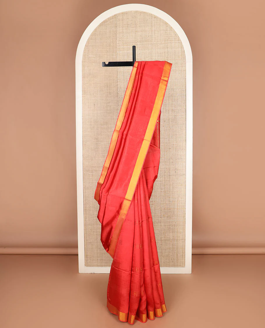Red buttas banana pith saree, bavanji zari border, and zari striped pallu