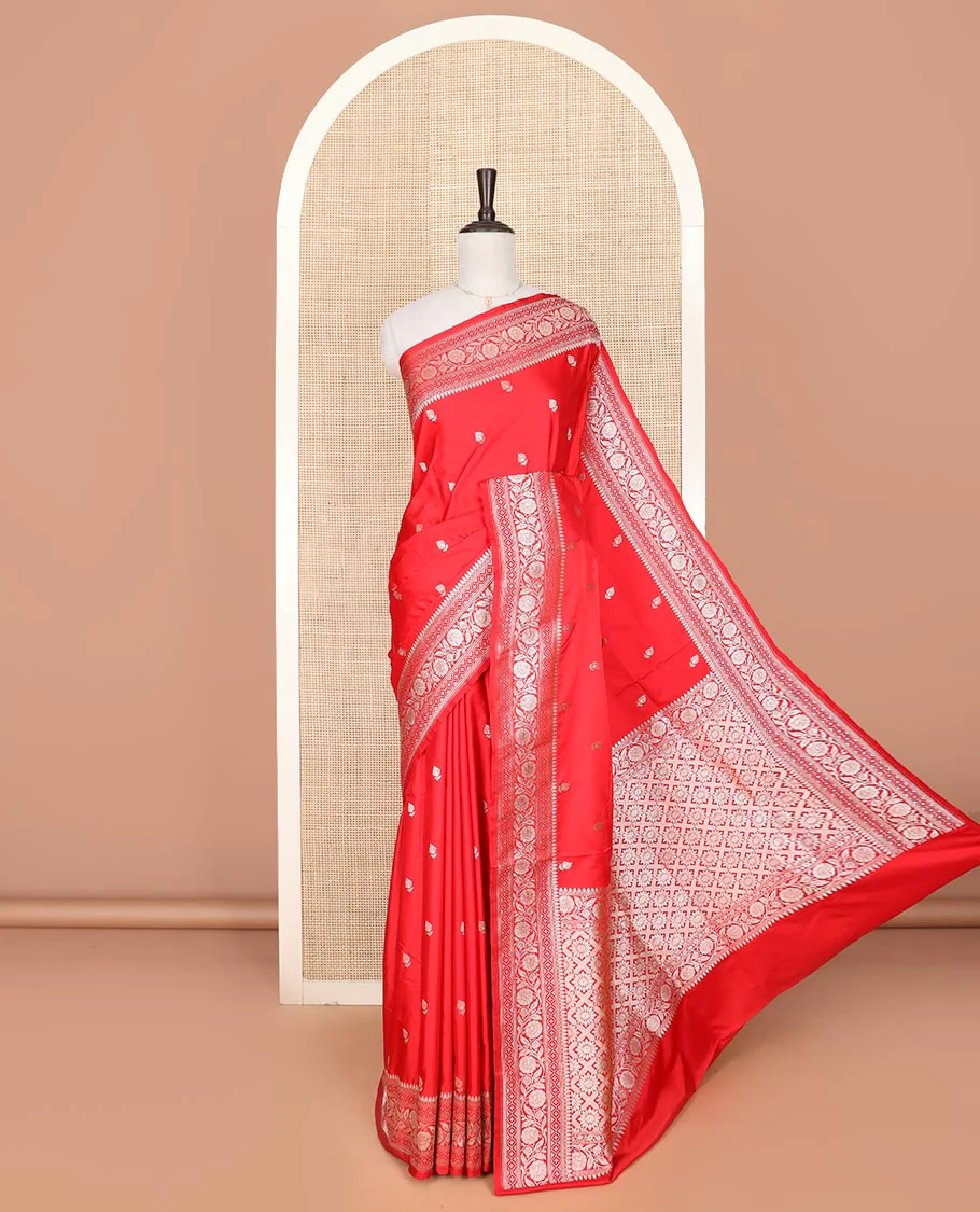 Red buttas mushru silk saree, traditional border of floral creeper designs, and zari-rich jaal pallu
