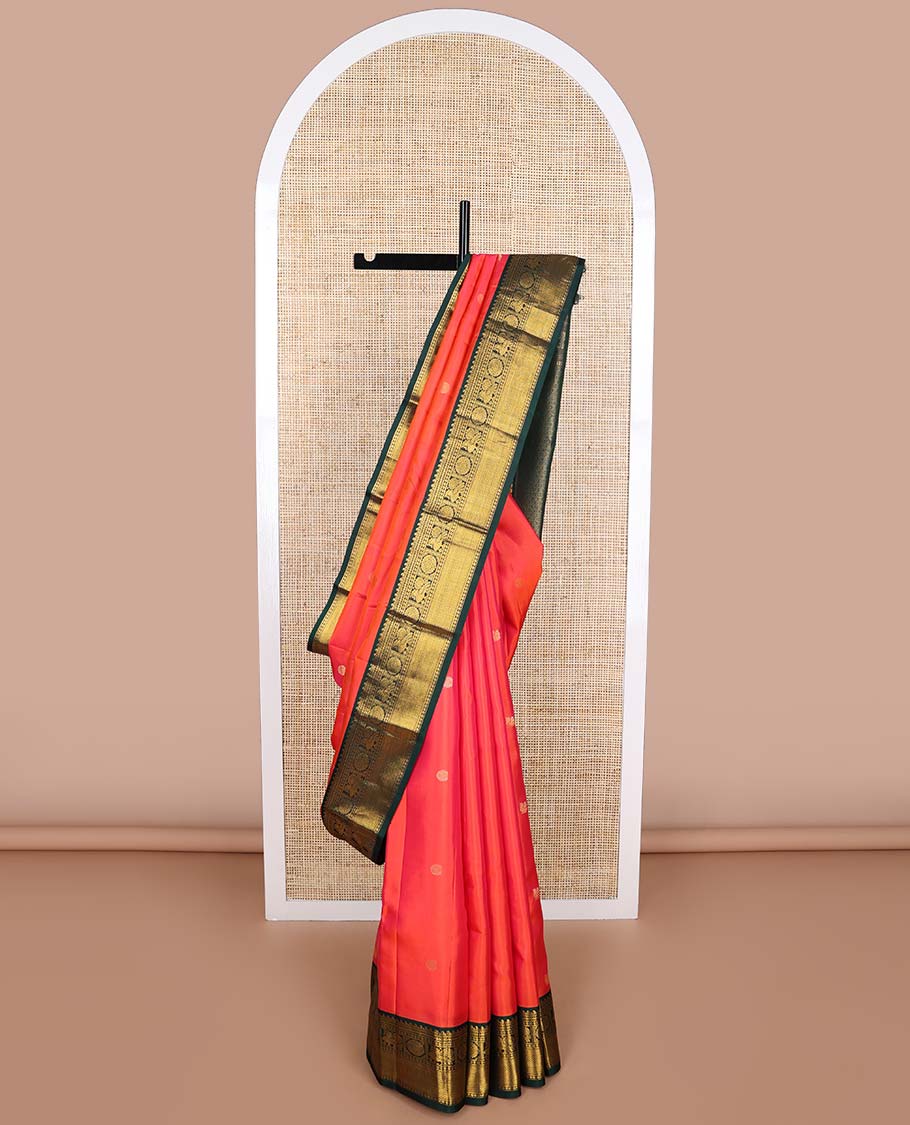 Red buttas Vasundhara silk saree with contrast border of manga, banaras, mayil , mayil kann, poo chakram design & zari design pallu
