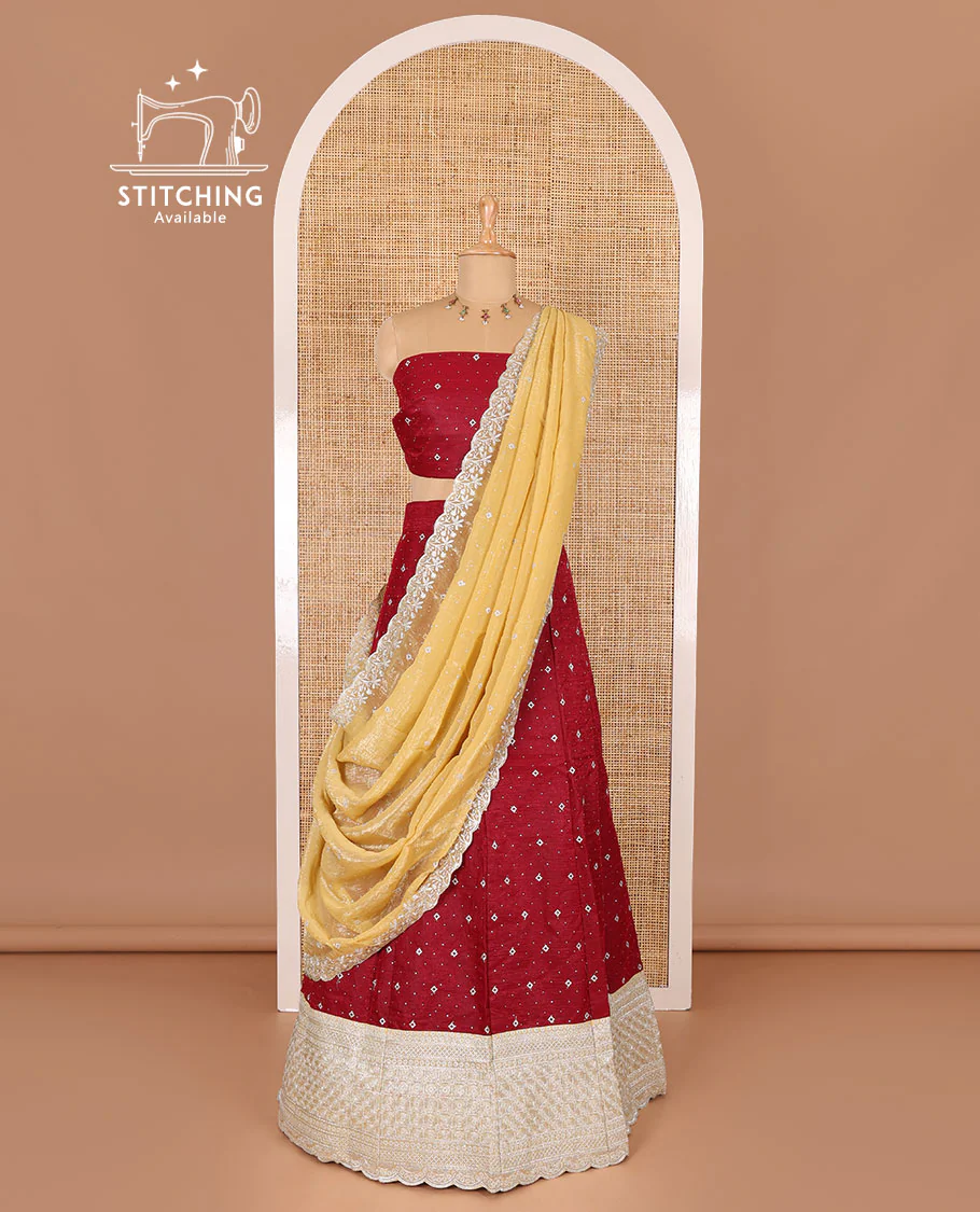 Red half-saree, floral motifs embroidered semi-raw silk top, matching embroidered blouse, and contrast scallop embroidered georgette dhavani